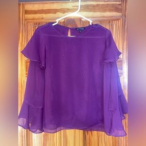 Women’s size medium plum color flows sleeve blouse